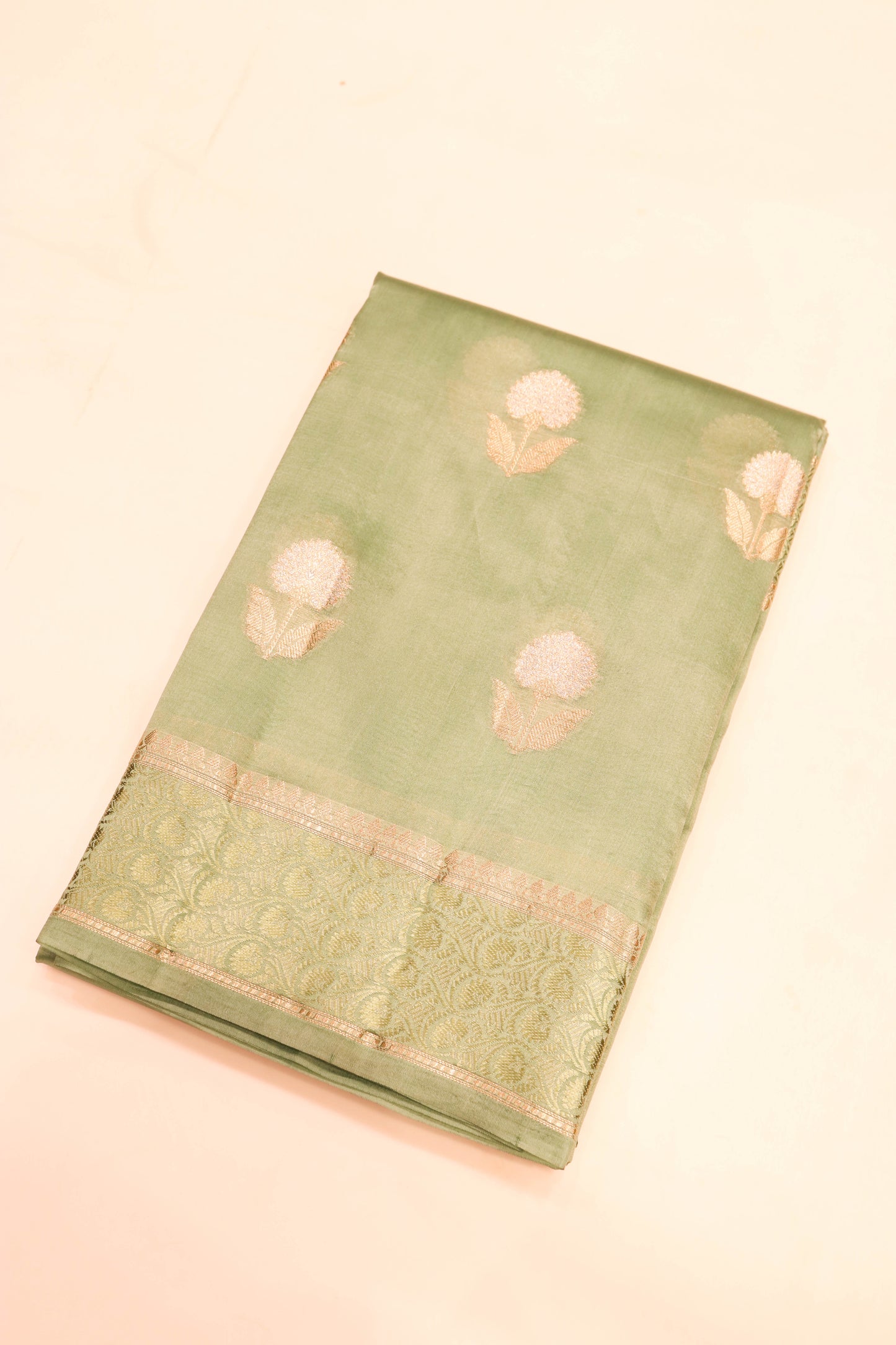 Resham Weaving Border And Silver And Gold Zari Motif In Pure Dupion Silk Green