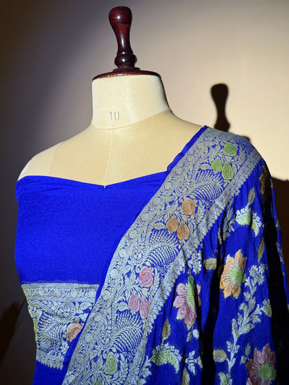 Traditional Banarasi Jaal Weaving With Hand Brush In Pure Khaddi Chiffon Saree - Blue
