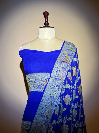 Traditional Banarasi Jaal Weaving With Hand Brush In Pure Khaddi Chiffon Saree - Blue